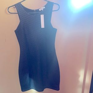 Women’s medium monteau black dress.